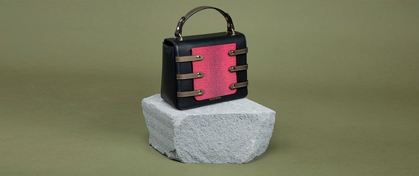 Black leather Asteria bag with Fuchsia pink phone pocket