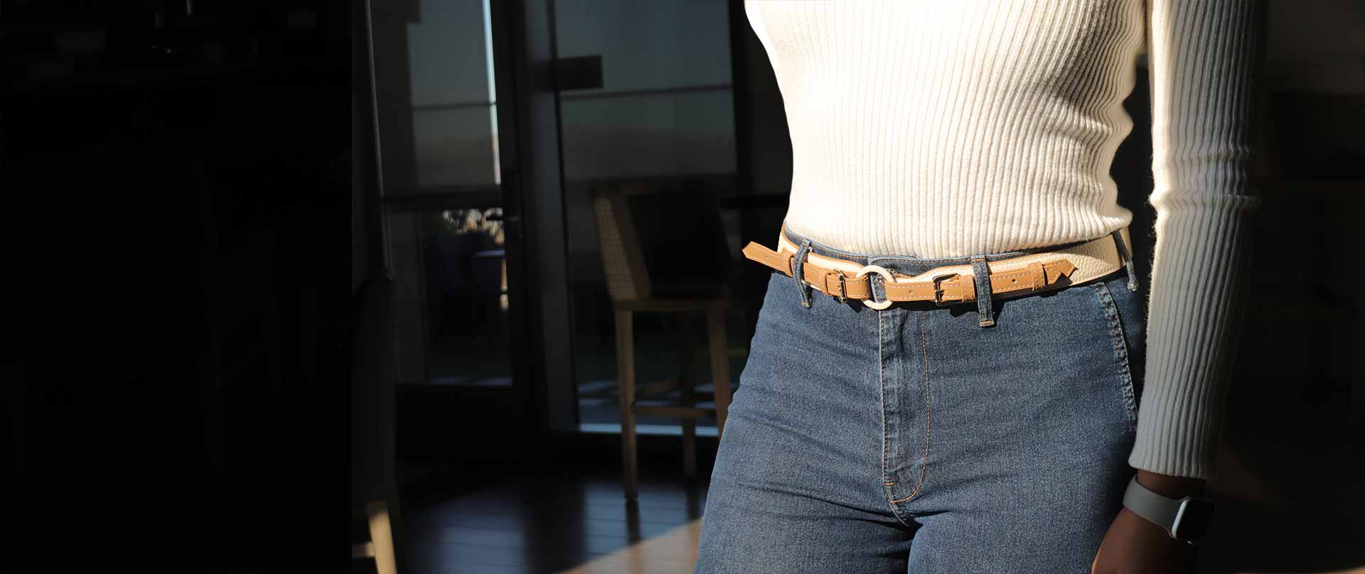 Ember Universal Belt in beige & white leather worn as a waist belt